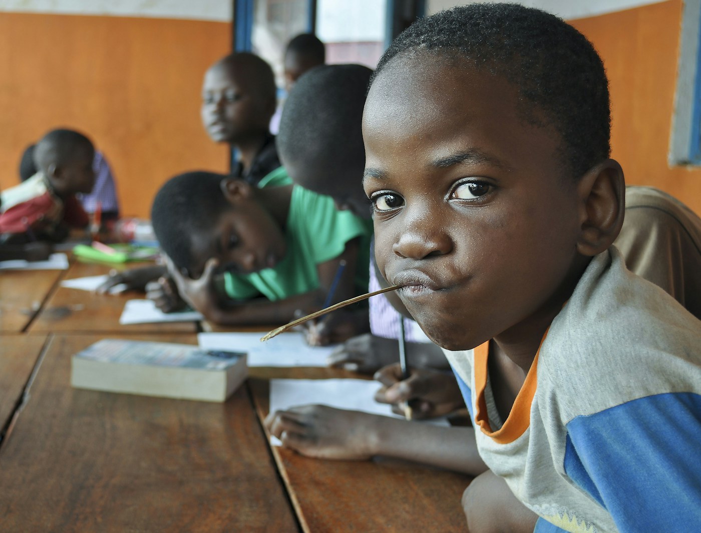 Children learning together in a classroom in Wakiso, Uganda